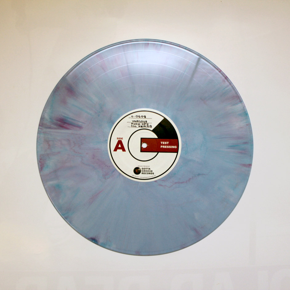 Product shots of V/A - Fuck Off All Nerds: A Benefit Compilation in Memory of Mitch Dubey