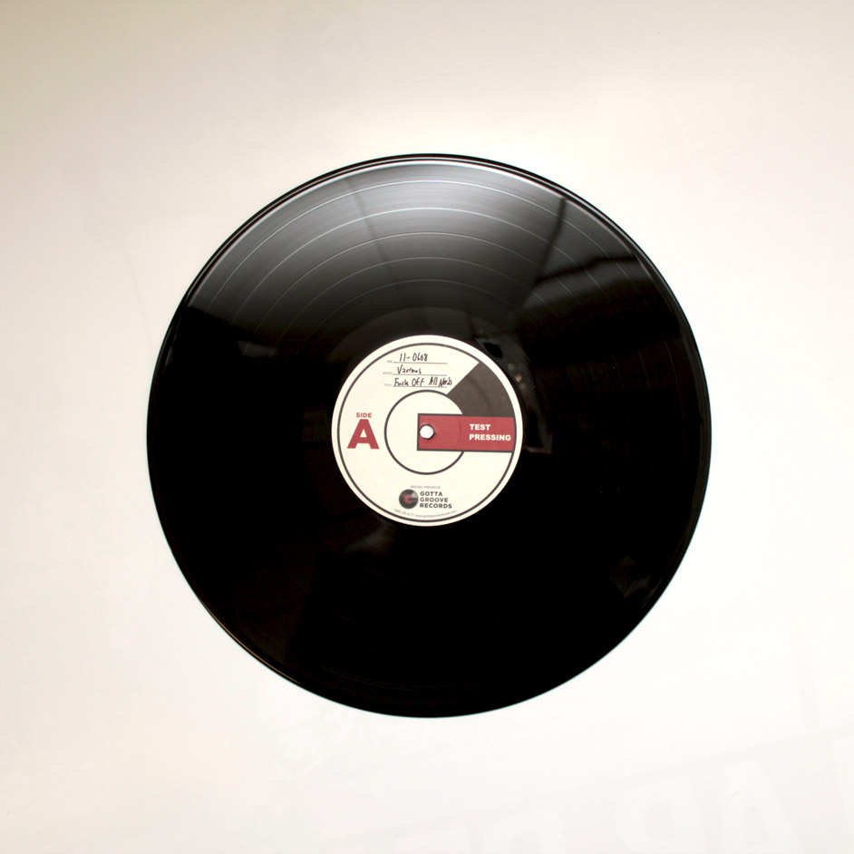 Product shots of V/A - Fuck Off All Nerds: A Benefit Compilation in Memory of Mitch Dubey