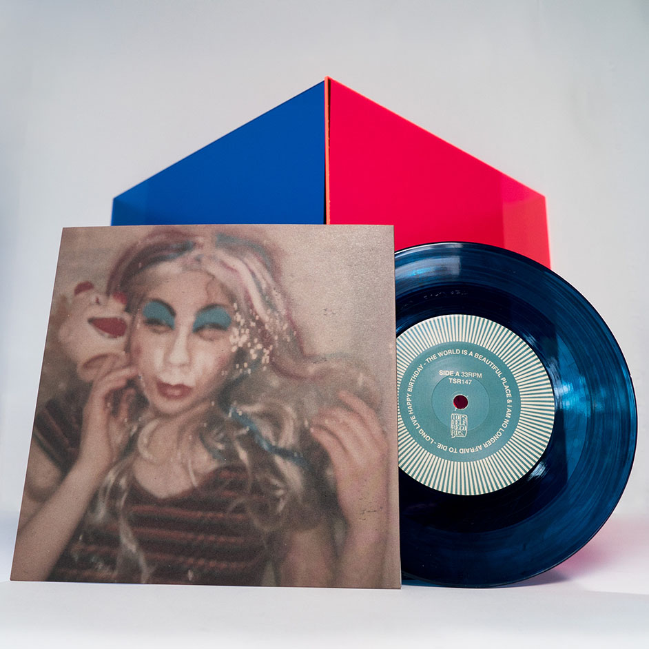 Product shots of The World Is a Beautiful Place & I Am No Longer Afraid to Die - Long Live Happy Birthday