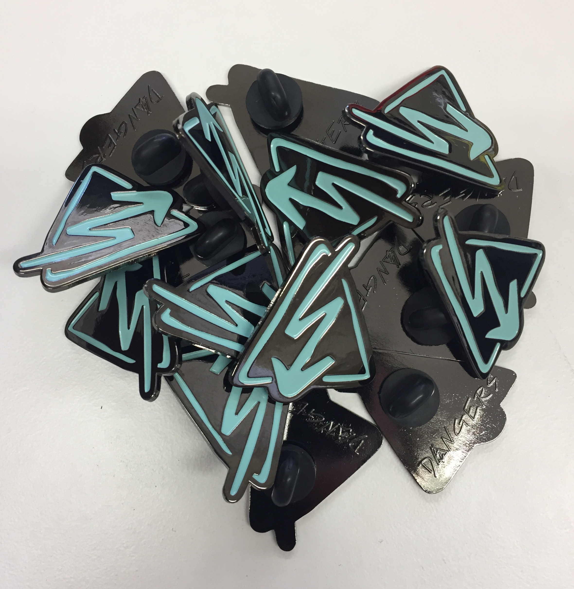 Product shots of DANGERS - Enamel Pin