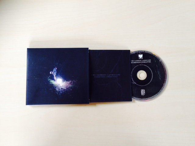 Product shots of The Saddest Landscape - Darkness Forgives