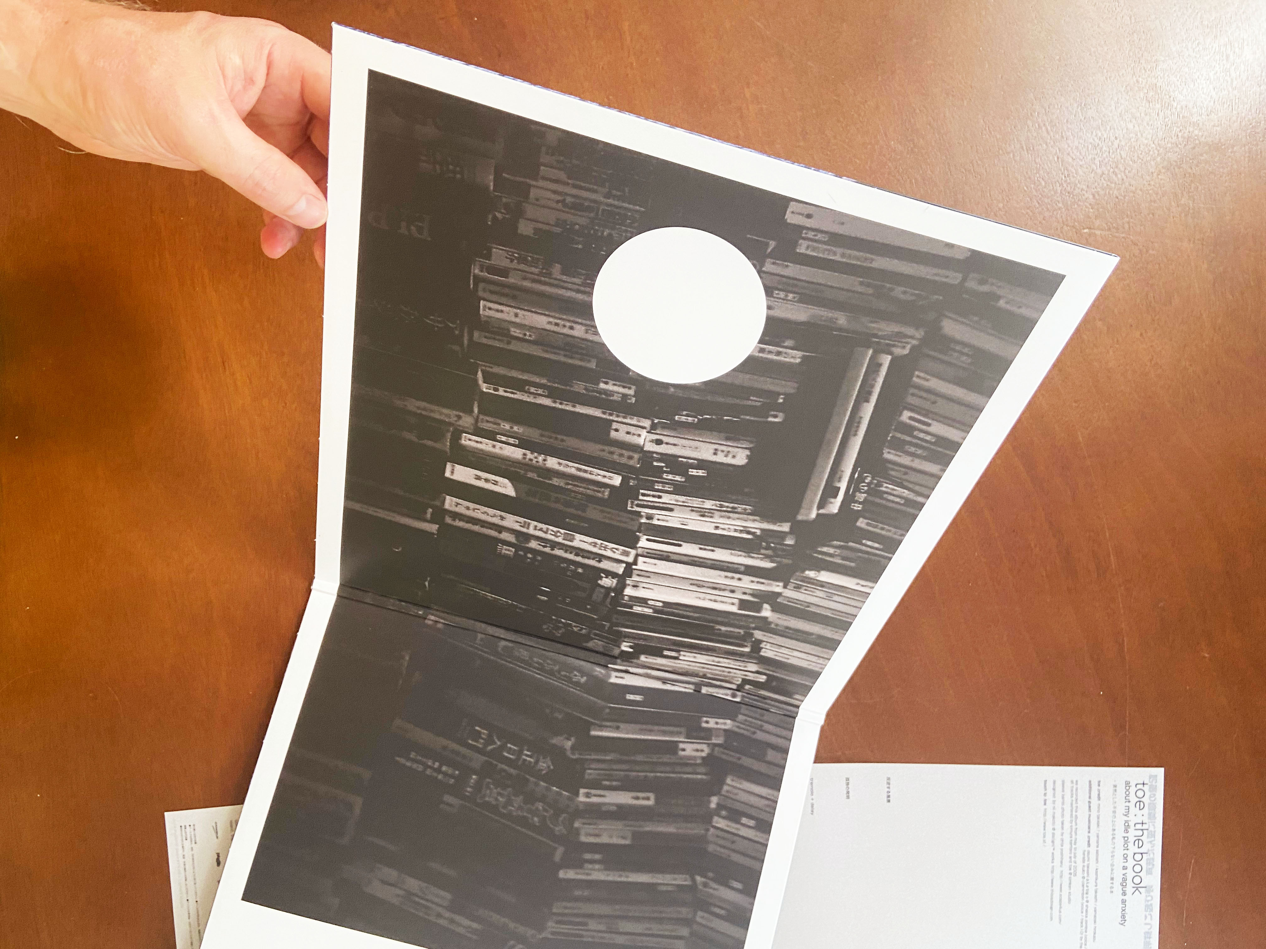 Product shots of toe - the book about my idle plot on a vague anxiety