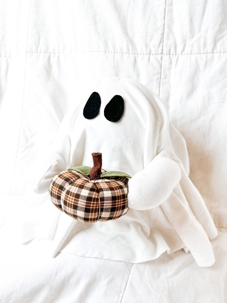 Ghost Holding Brown & Tan Plaid Pumpkin