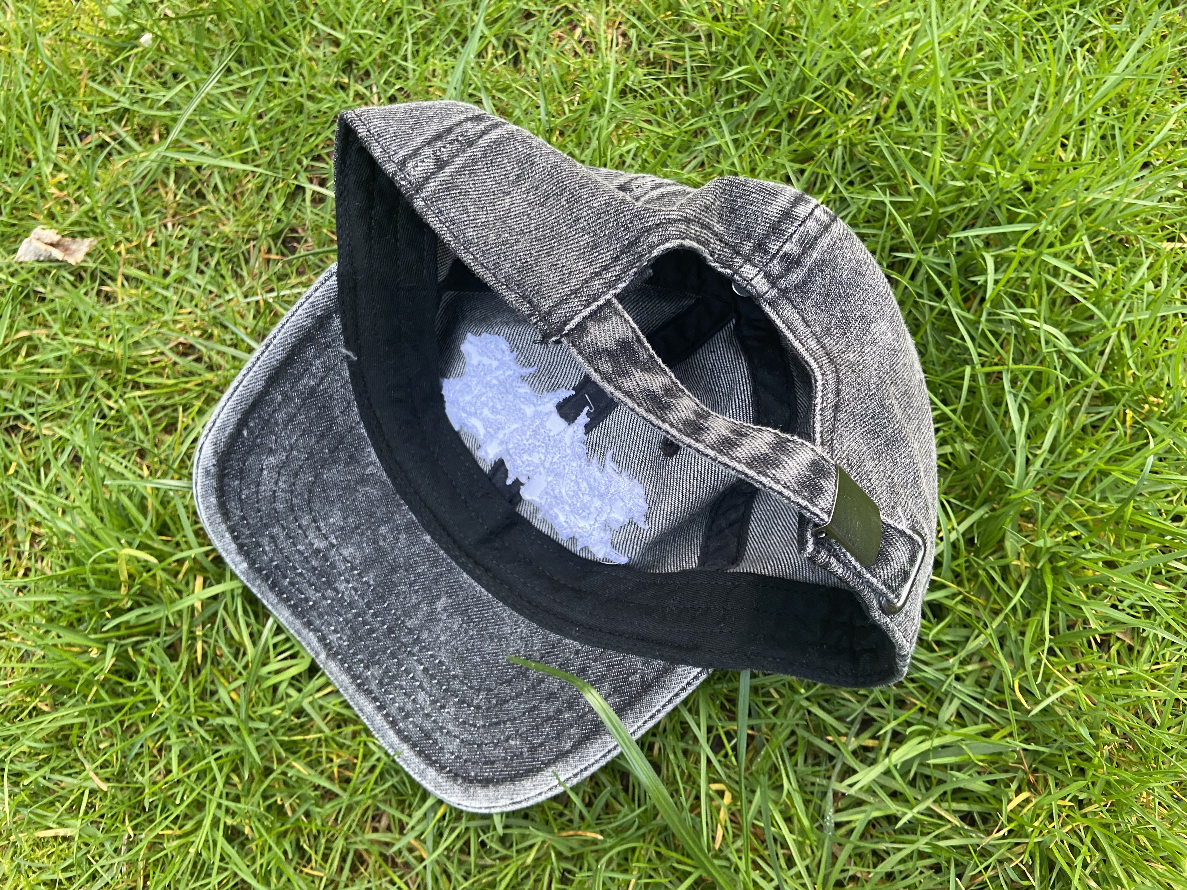 Product shots of Topshelf Records - slam logo baseball hat