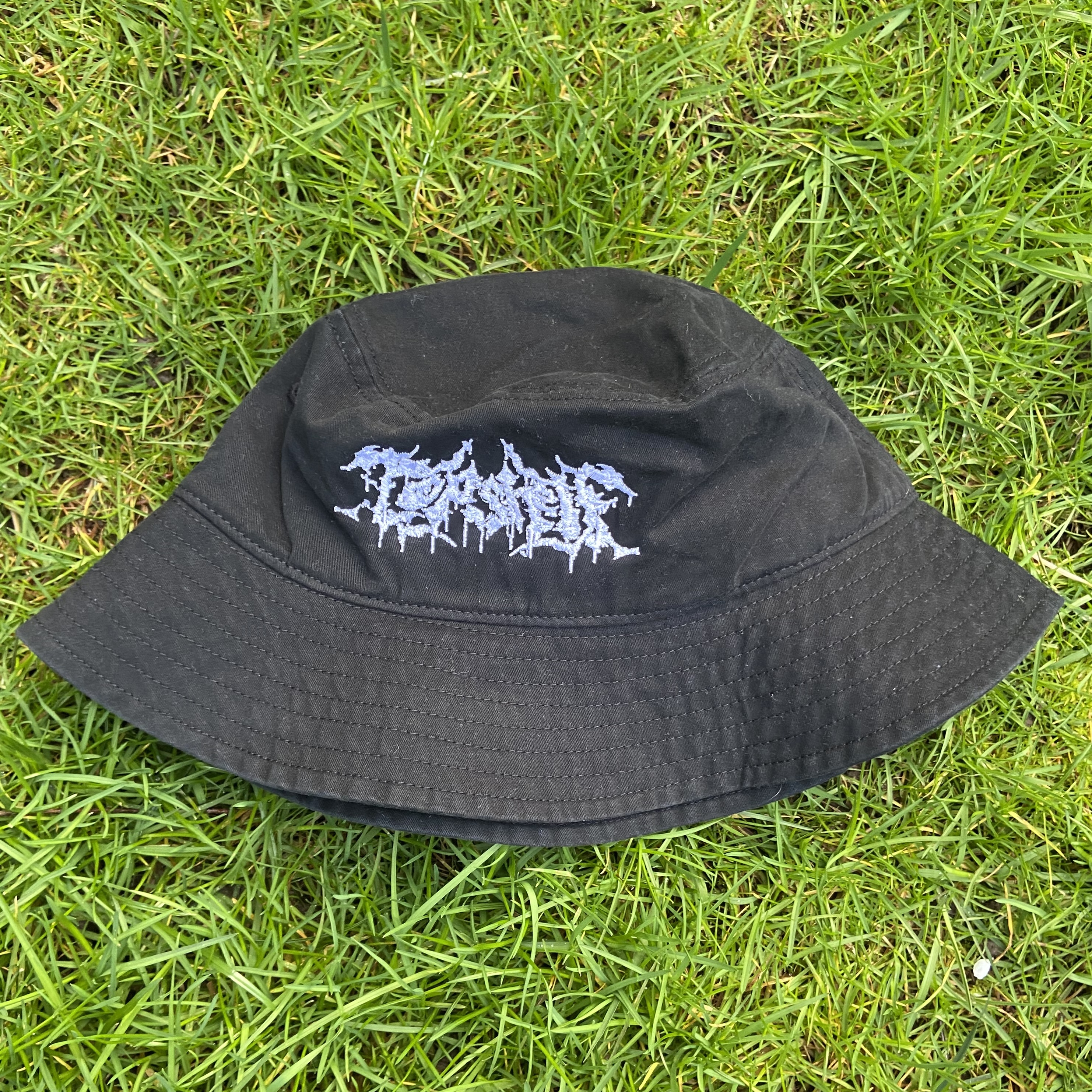 Product shots of Topshelf Records - slam logo bucket hat