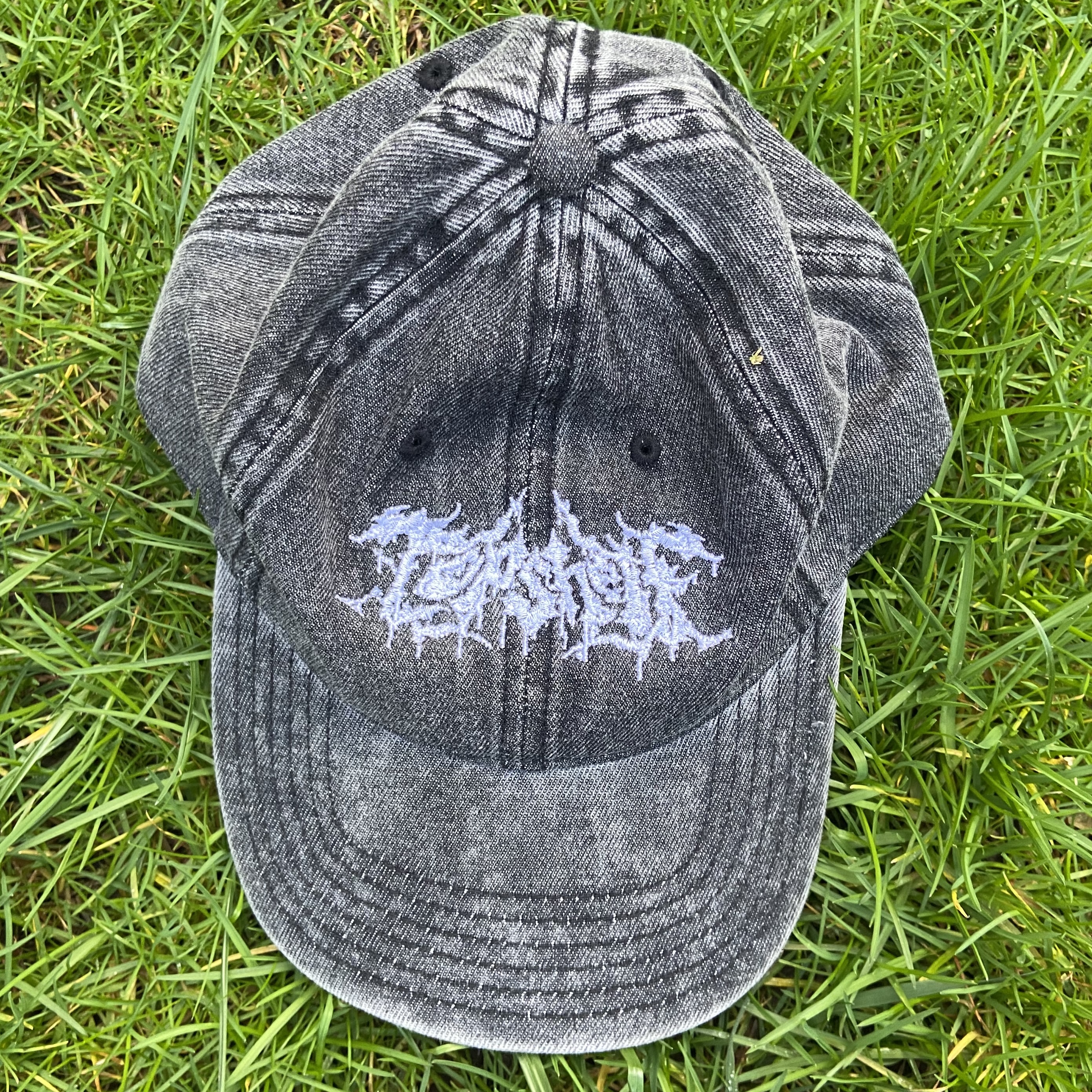 Product shots of Topshelf Records - slam logo baseball hat