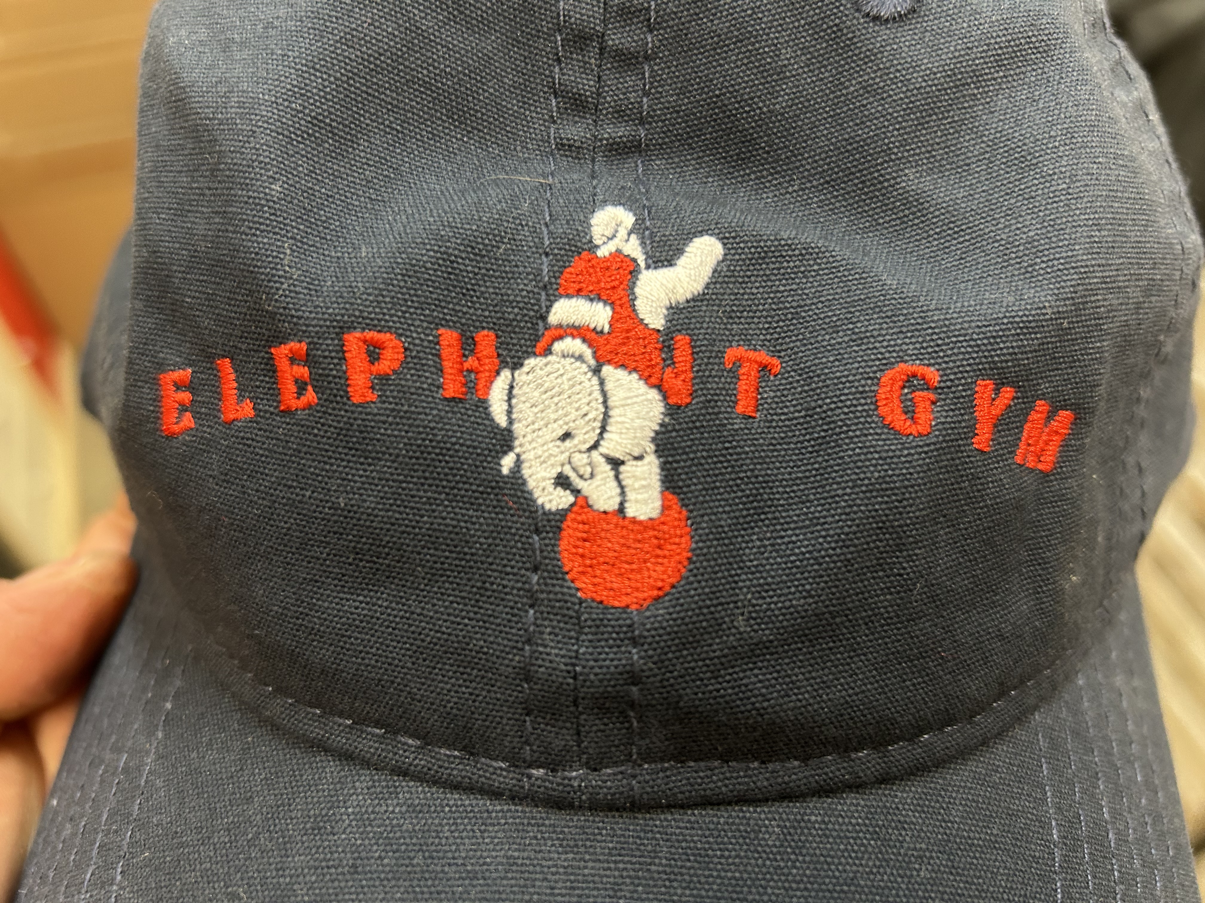 Product shots of Elephant Gym - Navy Blue Logo Hat