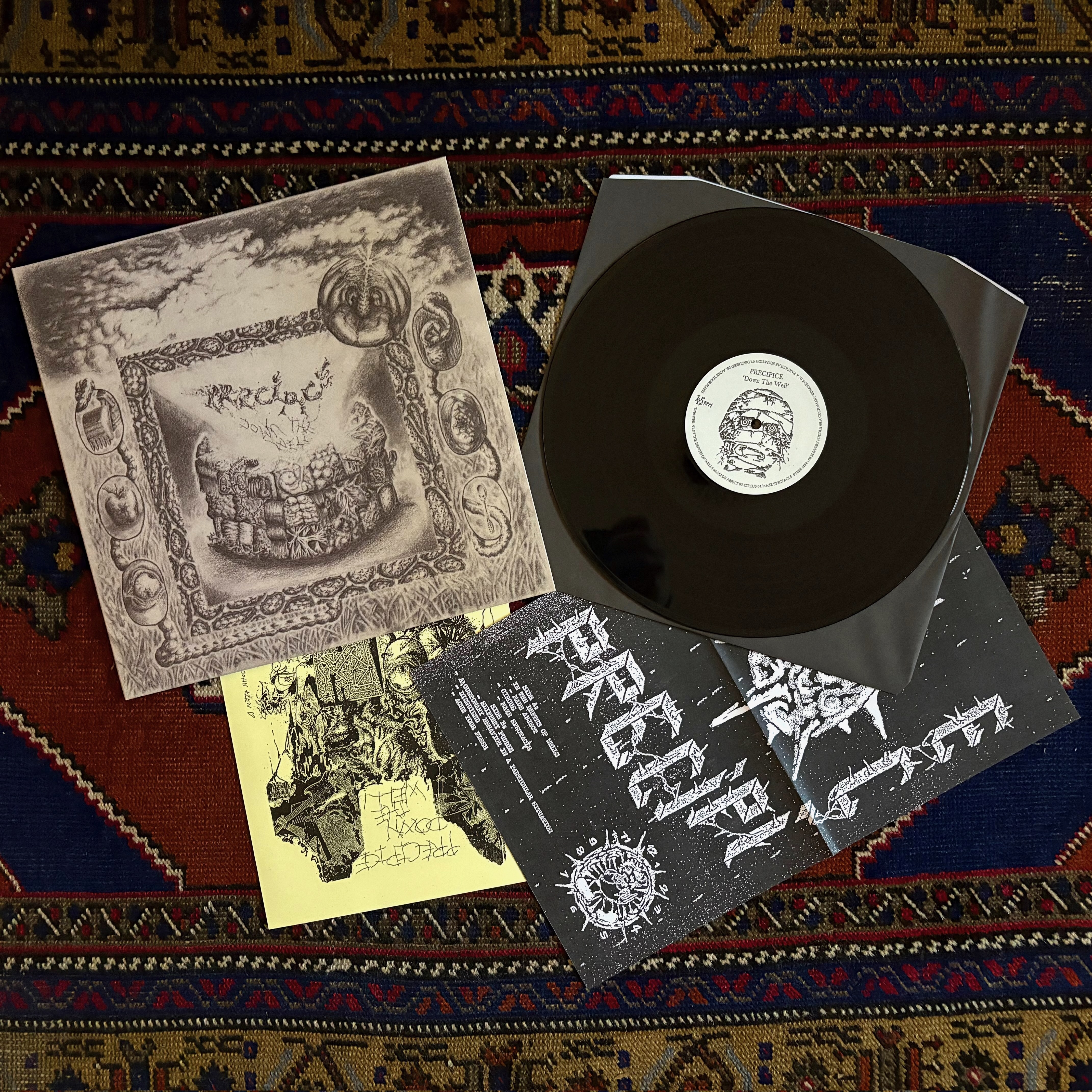 PRECIPICE - Down The Well (DISCOS ENFERMOS / URTICARIA RECORDS)