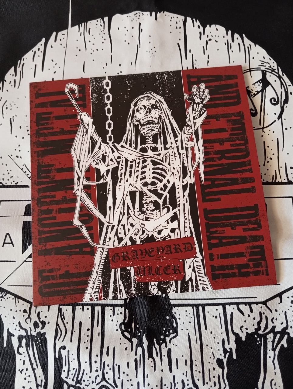 Graveyard / Ulcer - Of Ancient Metal And Eternal Death (7