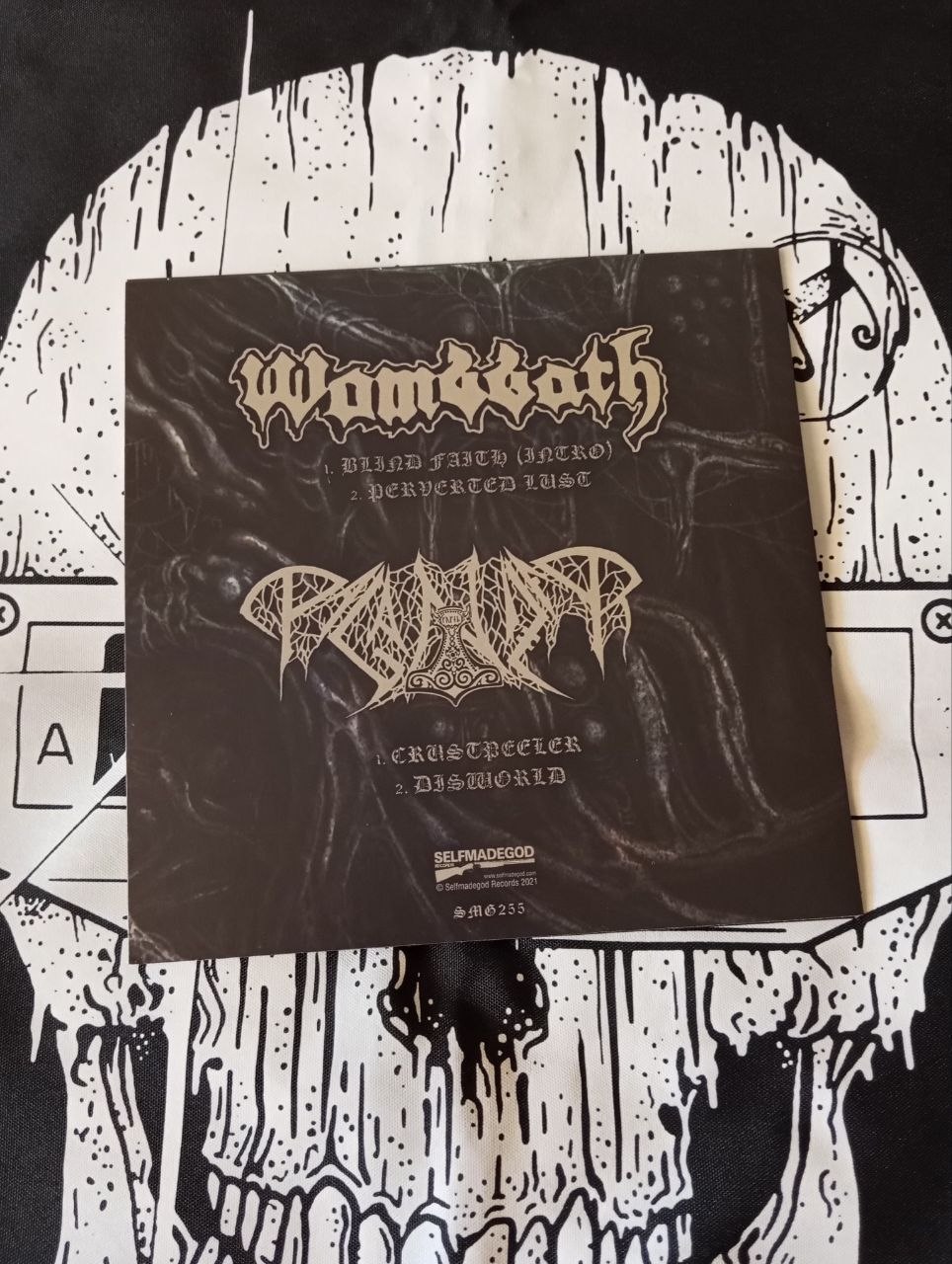 Wombbath / Paganizer - Hymns To Rot (7