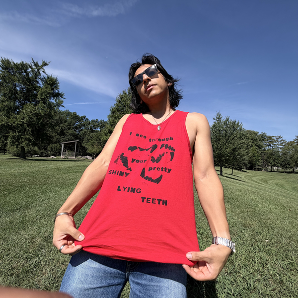 LYING TEETH TANK