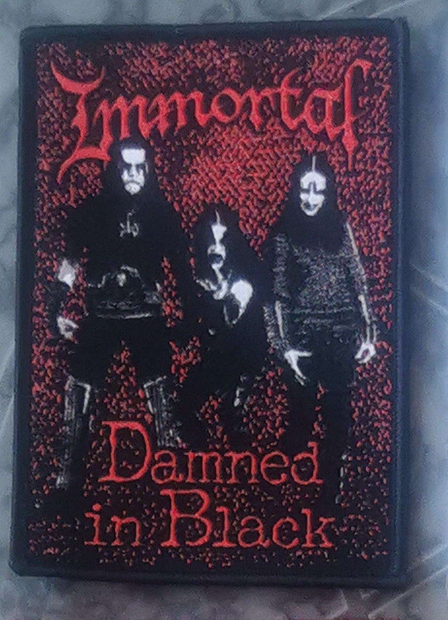 IMMORTAL - Damned In Black